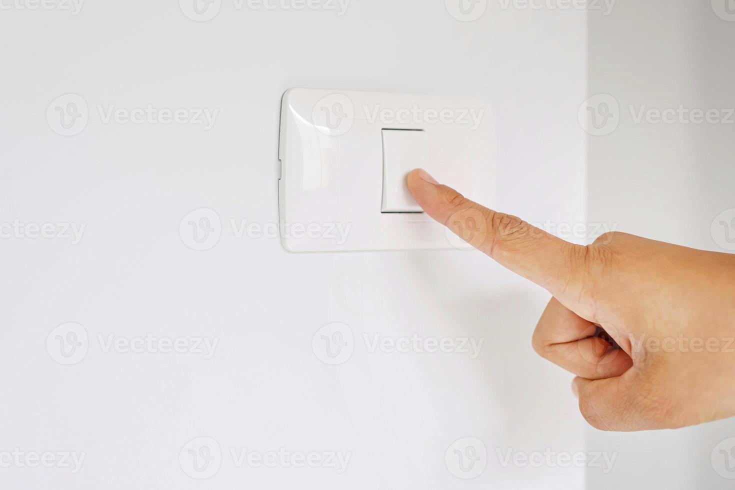 Turn off the power switch to save electricity in the house. photo