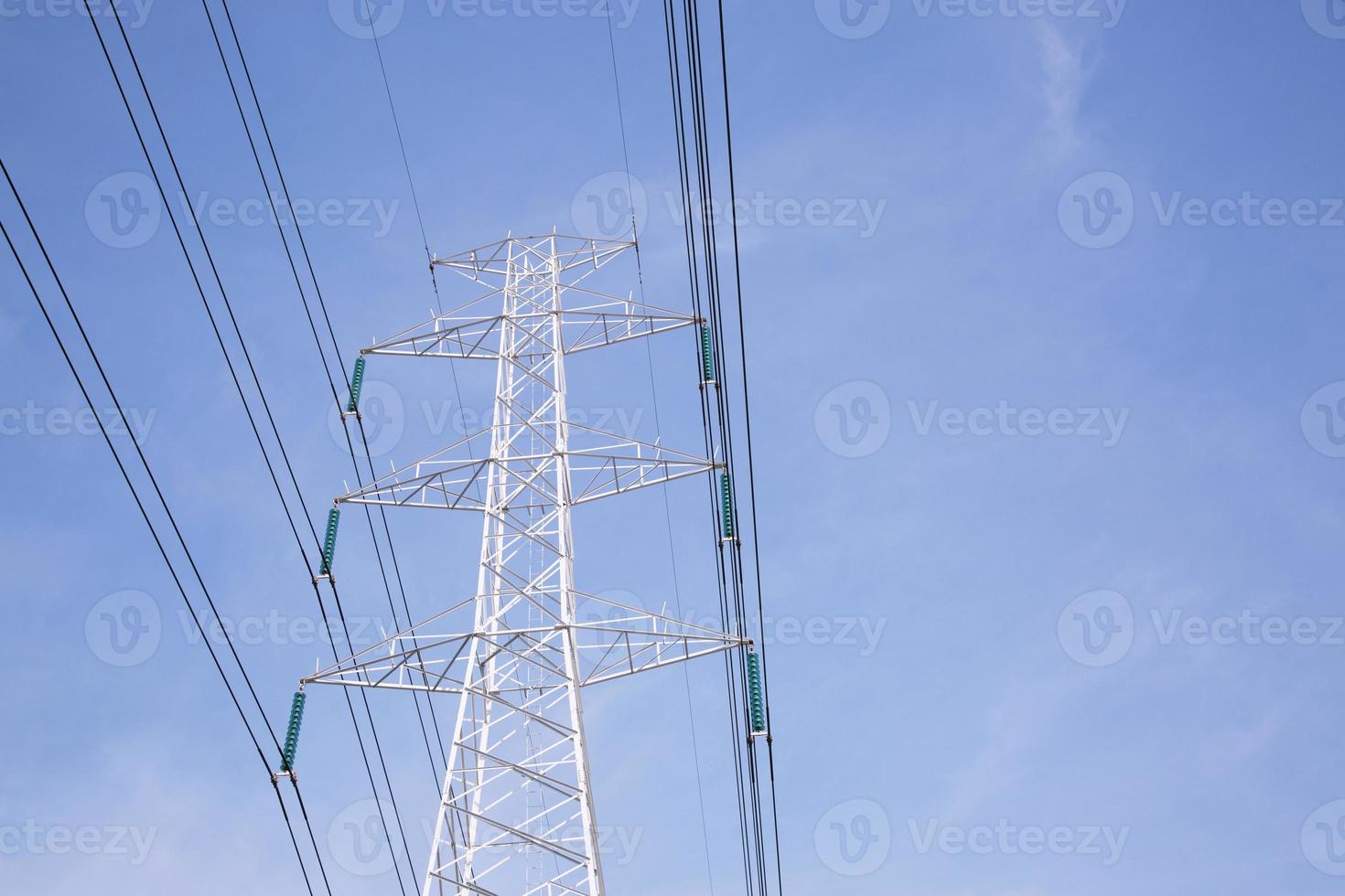 high voltage electric pole sky background photo