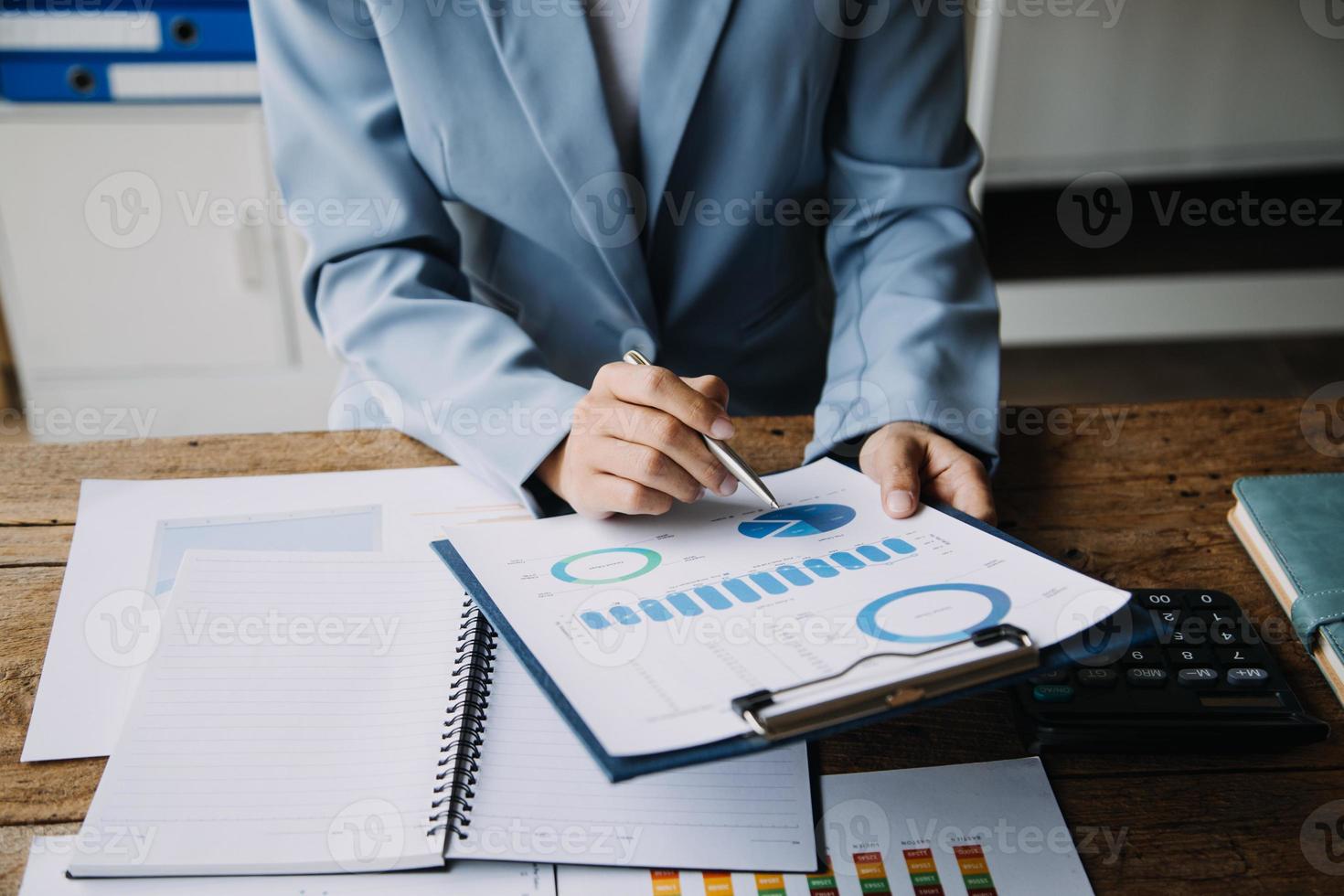 Business Documents, Auditor businesswoman checking searching document legal prepare paperwork or report for analysis TAX time,accountant Documents data contract partner deal in workplace office photo