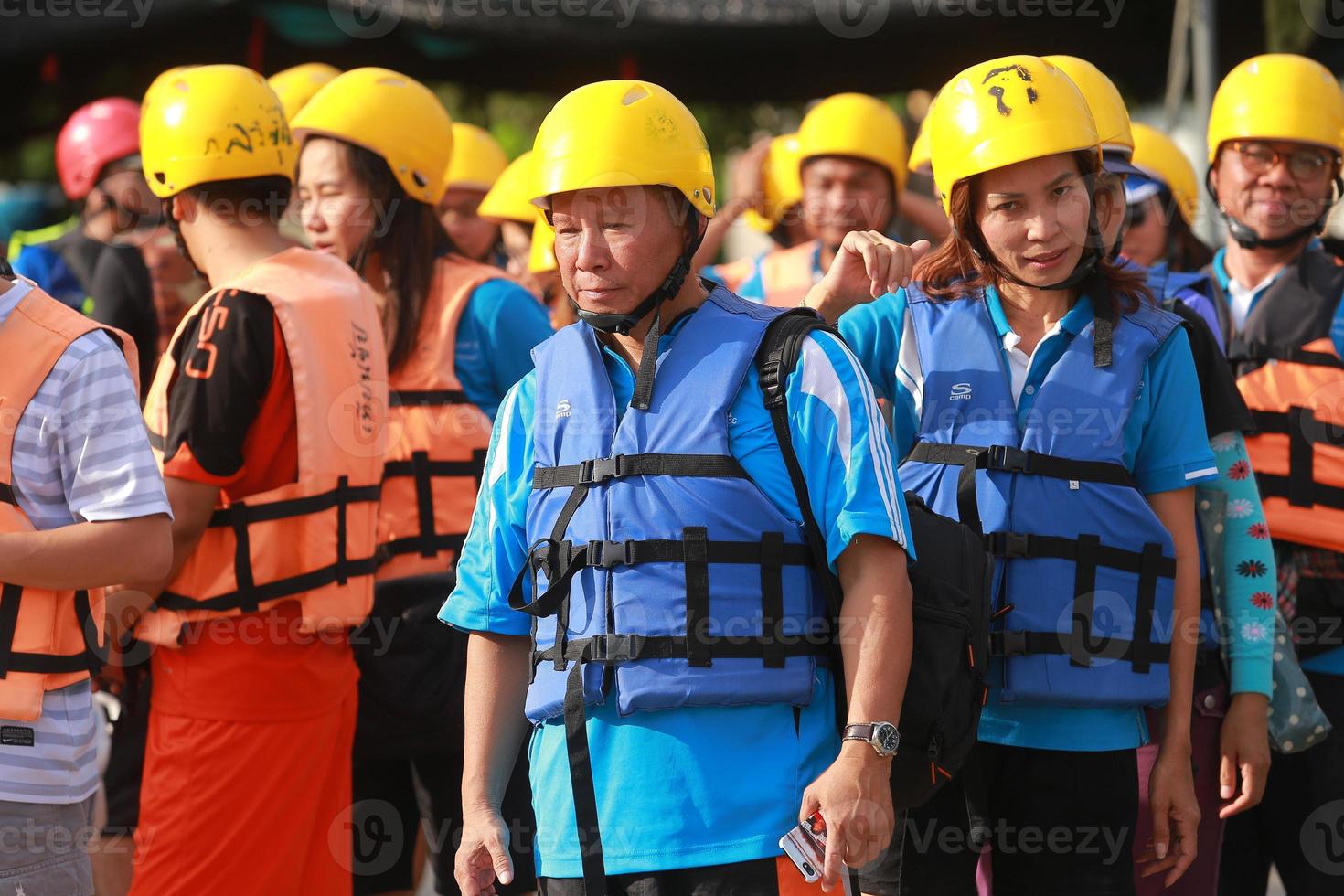 NAKHONNAYOK, THAILAND,DECEMBER 19  Group of adventurer doing white water rafting at dam, on December 19, 2015,The river is popular for its scenic nature view. photo