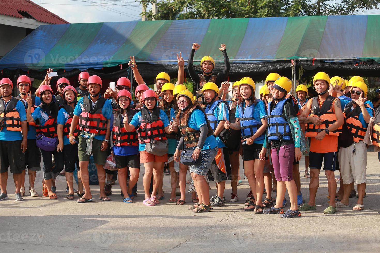 NAKHONNAYOK, THAILAND,DECEMBER 19  Group of adventurer doing white water rafting at dam, on December 19, 2015,The river is popular for its scenic nature view. photo