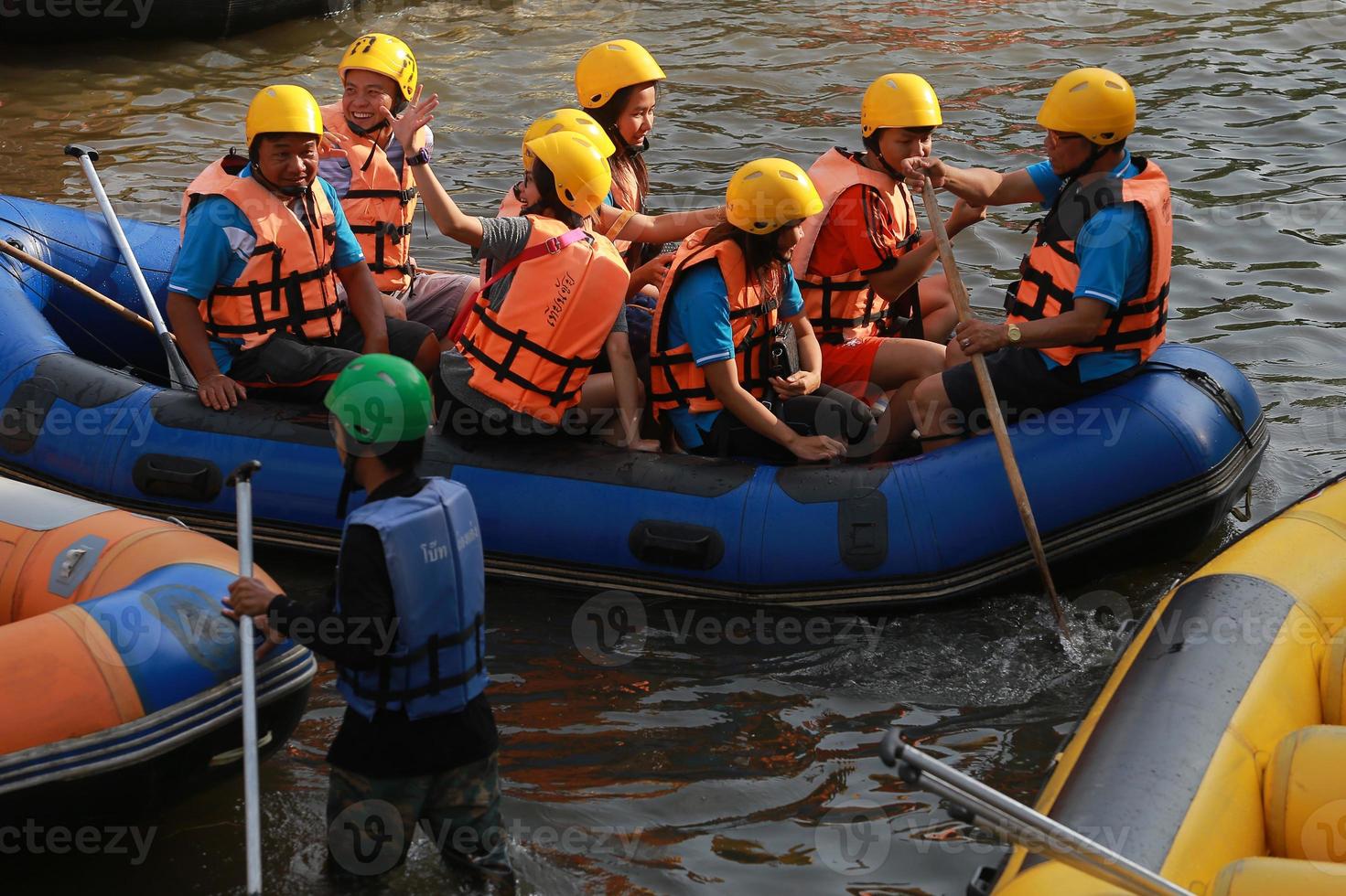 NAKHONNAYOK, THAILAND,DECEMBER 19  Group of adventurer doing white water rafting at dam, on December 19, 2015,The river is popular for its scenic nature view. photo