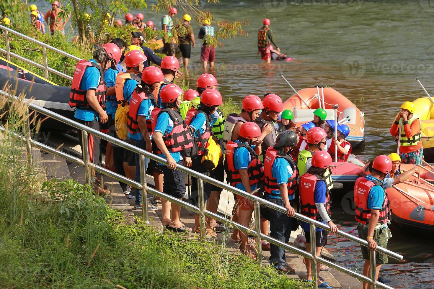 NAKHONNAYOK, THAILAND,DECEMBER 19  Group of adventurer doing white water rafting at dam, on December 19, 2015,The river is popular for its scenic nature view. photo