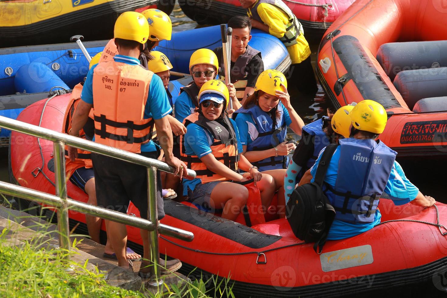 NAKHONNAYOK, THAILAND,DECEMBER 19  Group of adventurer doing white water rafting at dam, on December 19, 2015,The river is popular for its scenic nature view. photo
