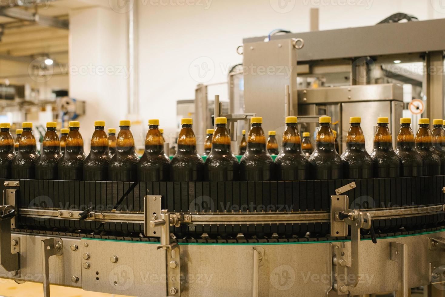 Conveyor at the brewery for bottling beer photo