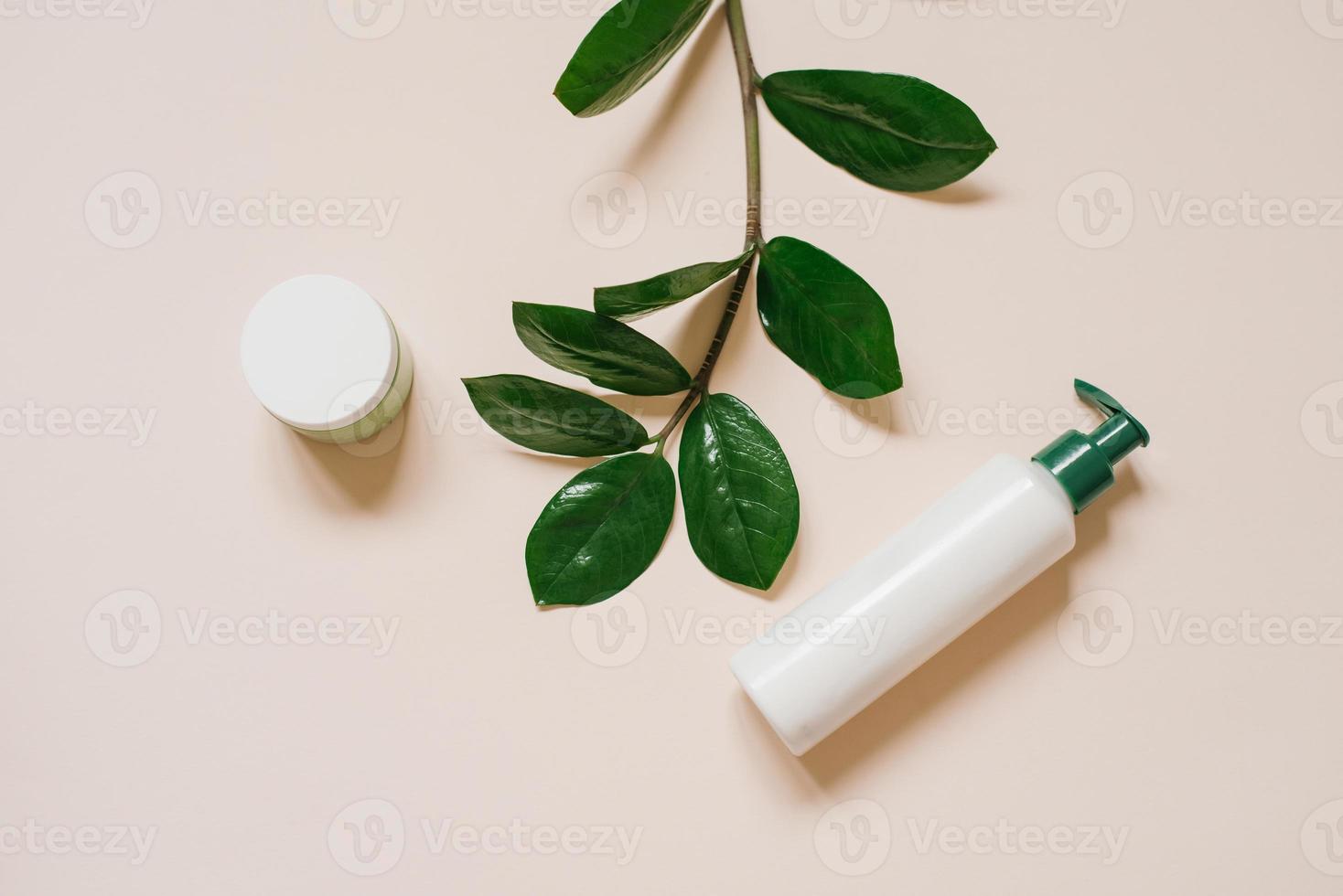 Concept of natural cosmetics. Organic cosmetics in bottles and jars. Top view, lay flat. Mockup of the corporate identity of the cosmetic SPA photo