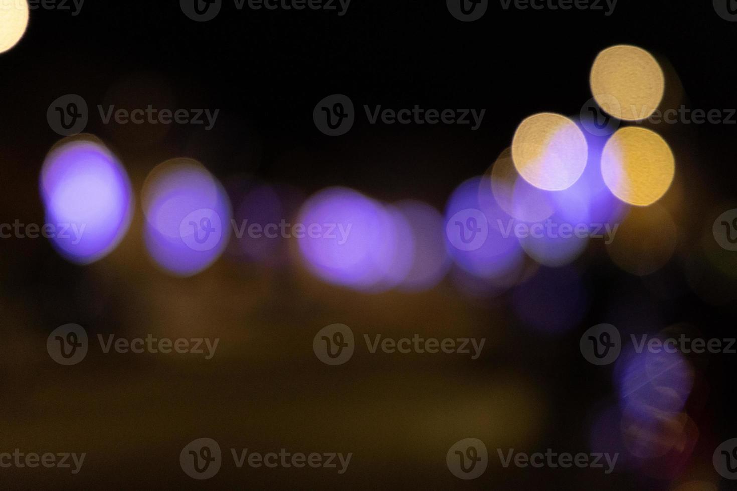 colorful Christmas background with bokeh on a black background photo