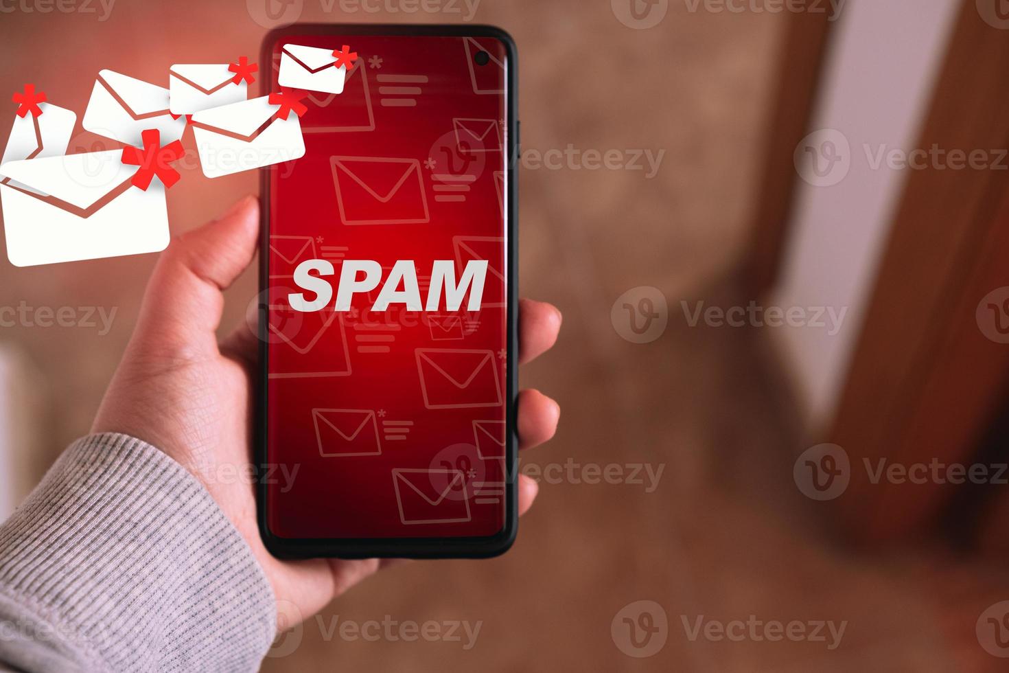 Woman showing mail spam on her smartphone. Communication business technology. Protect spam mail from internet cyber security. photo