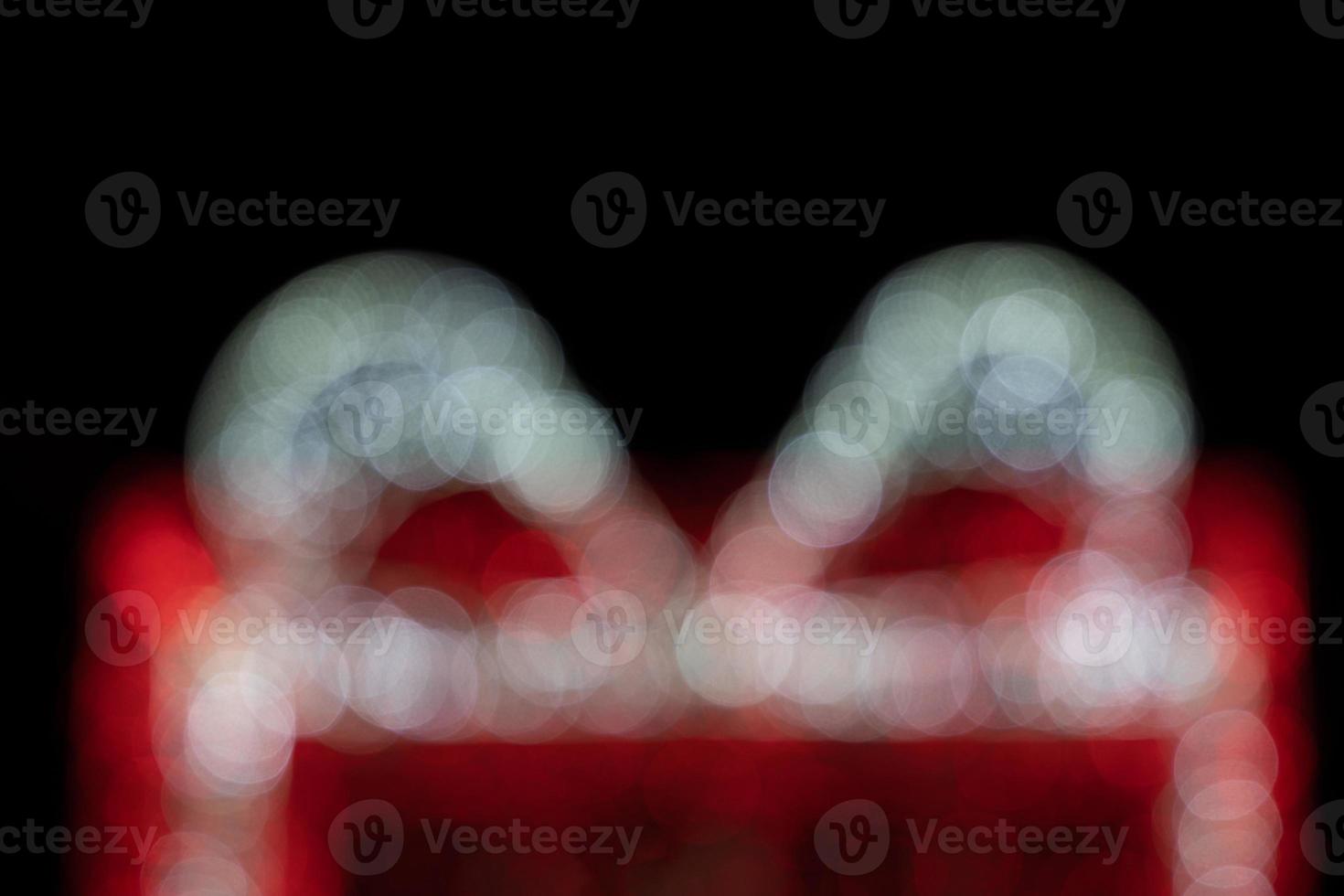 colorful Christmas background with bokeh on a black background photo