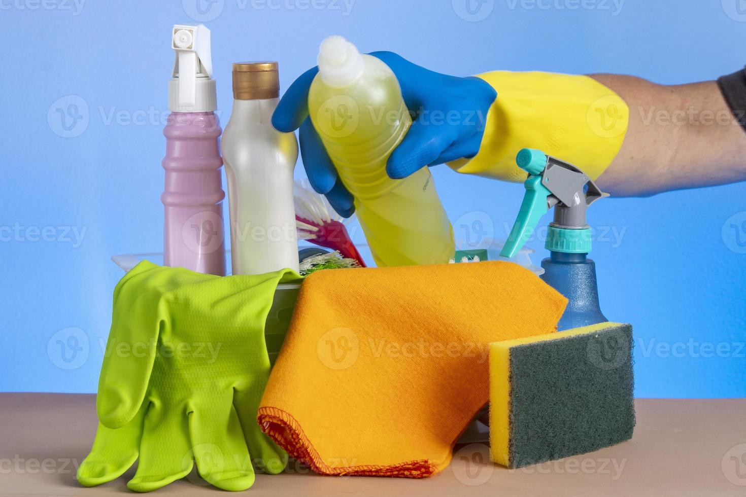 basket with cleaning products for home hygiene use photo