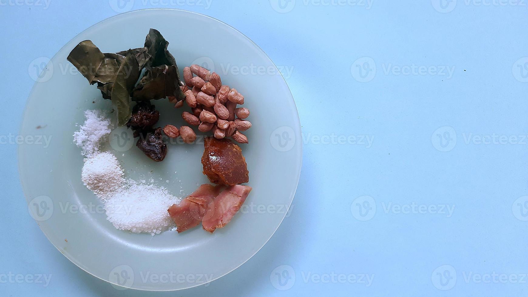 various spices for cooking fried chicken with blue background photo