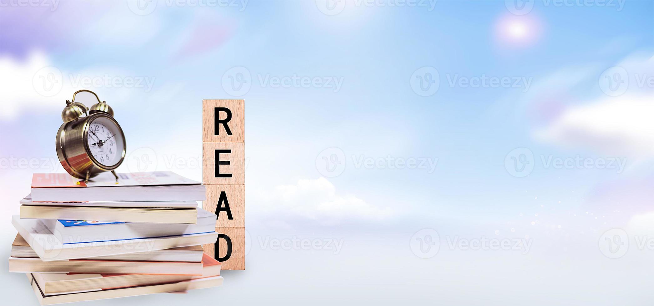 World book day, stack of books with glasses on mint background photo