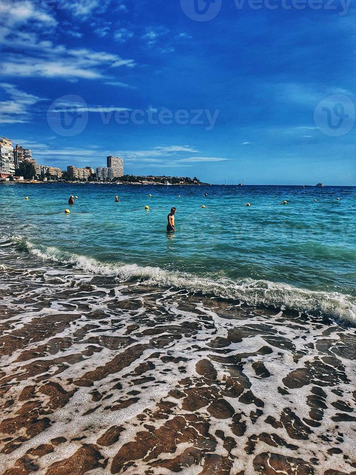 summer beach landscape in the spanish city of Alicante on a sunny day photo