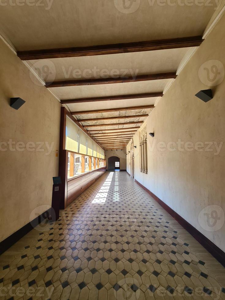 long corridor in historic building architecture background photo