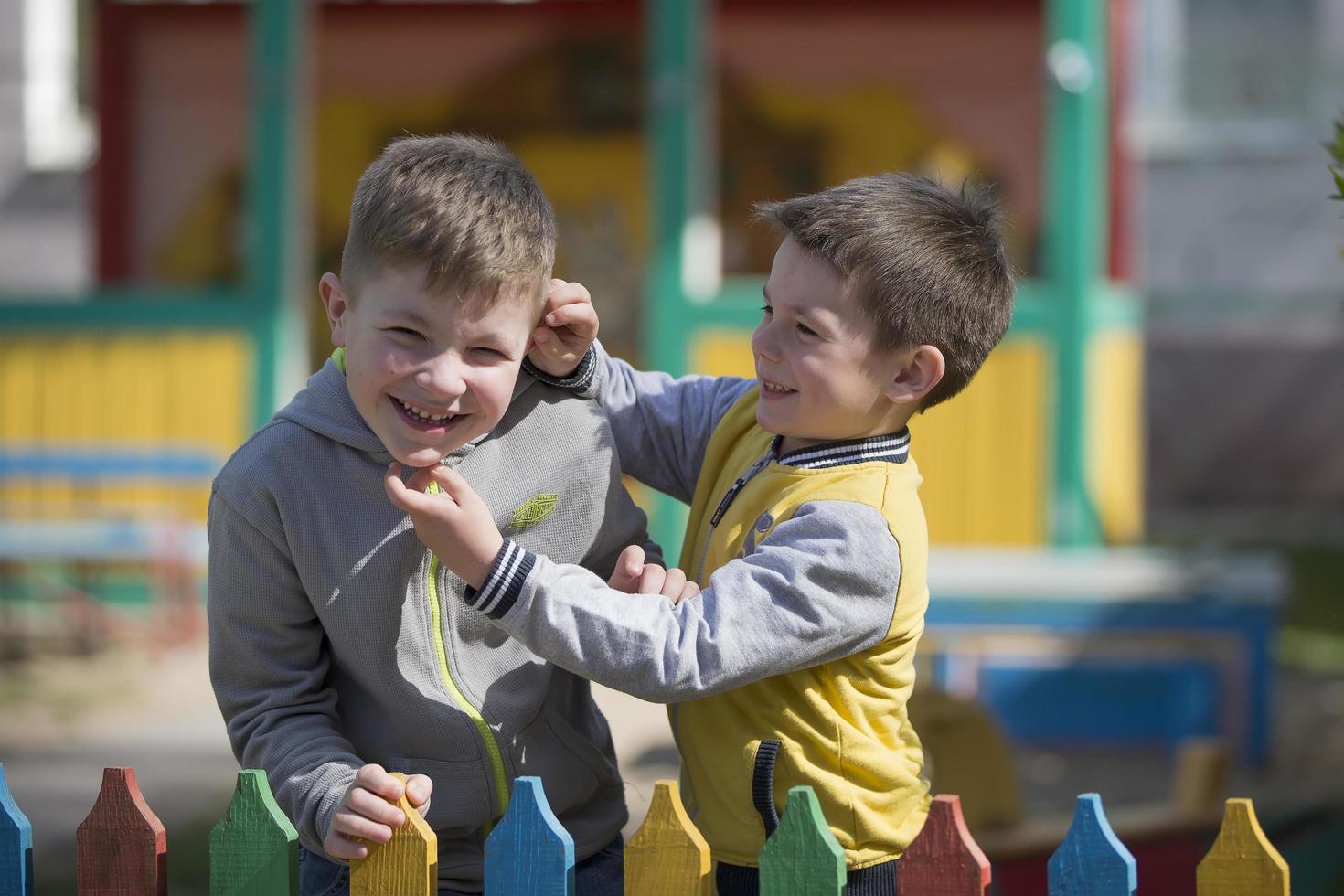 Kindergarten boys in the playground photo