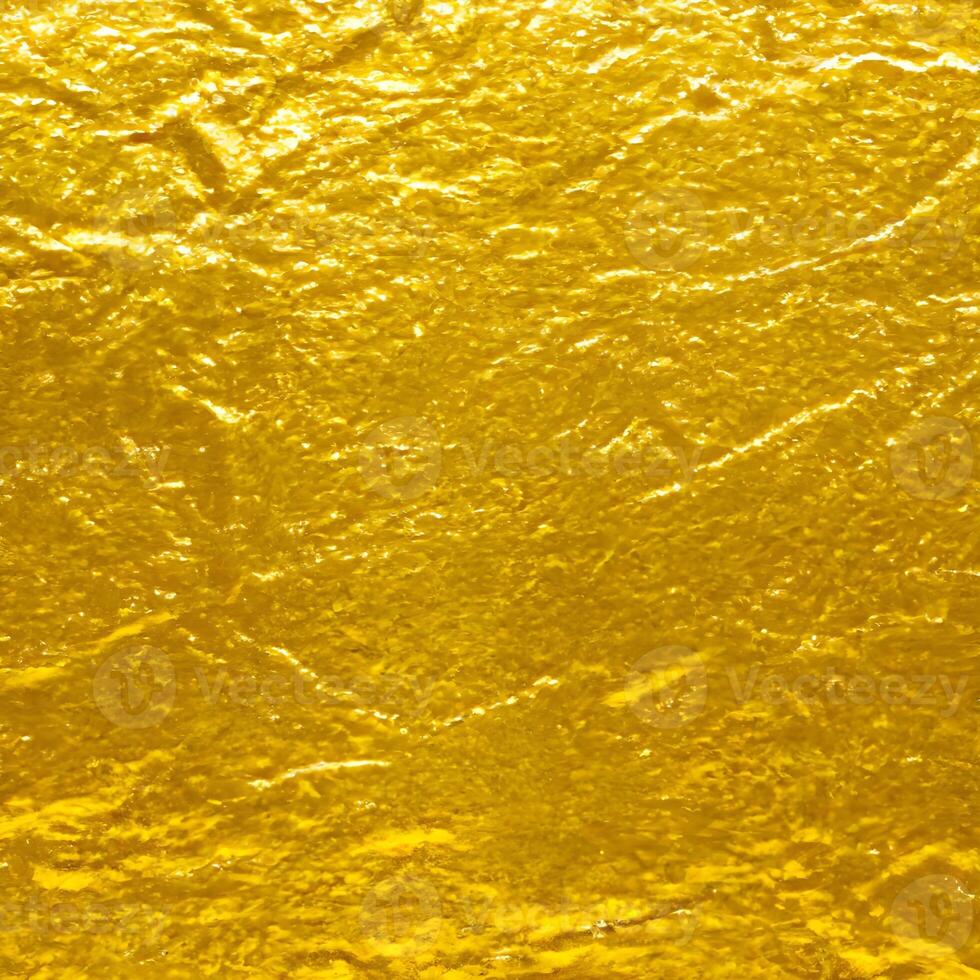 oro textura antecedentes. cerca arriba de brillante superficie de oro. dorado suave material. oro hoja. generativo ai. foto