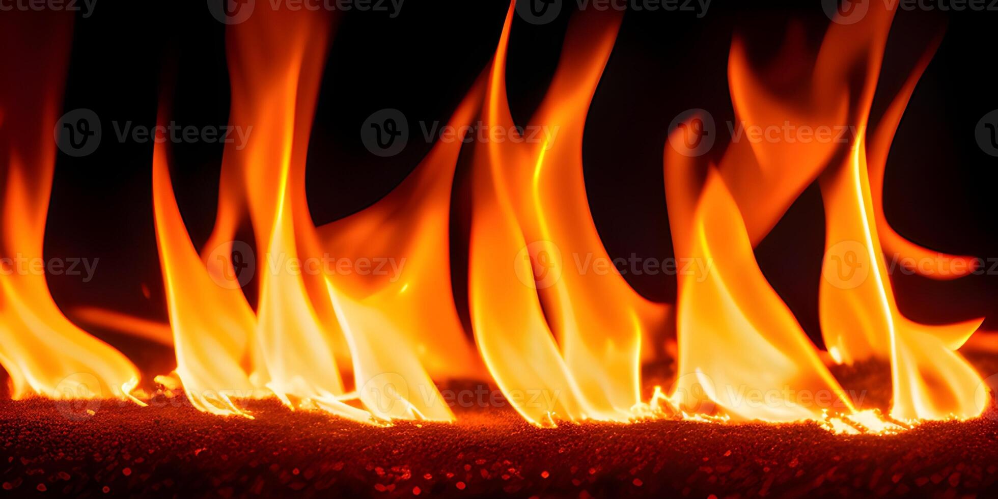 close up of fire flames on black background. hellfire background. . photo