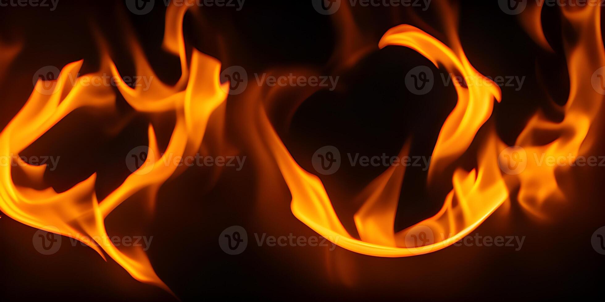 close up of fire flames on black background. hellfire background. . photo