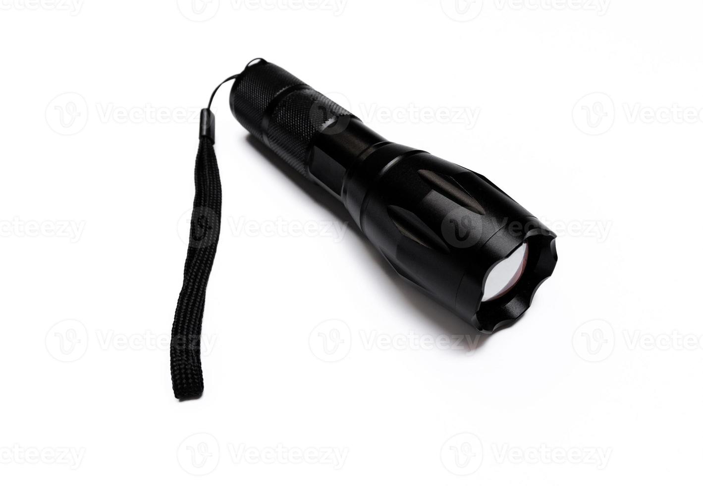 A flashlight isolated on white background. photo