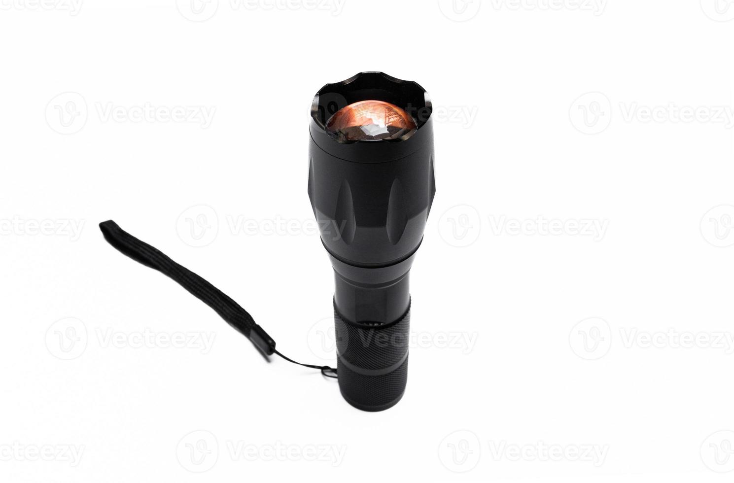 A flashlight isolated on white background. photo