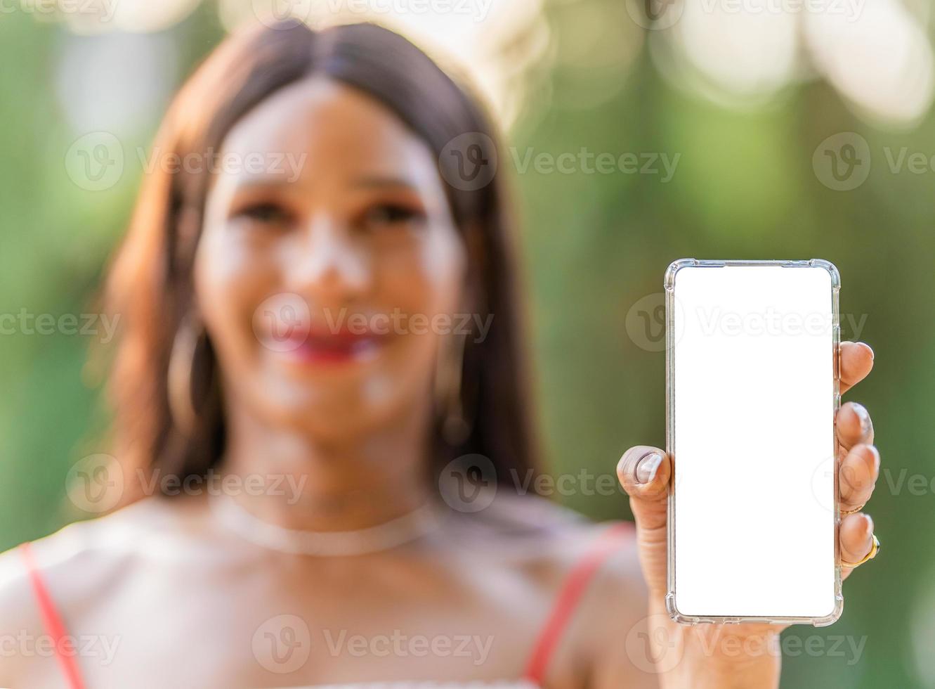 Focus on the screen of a mobile in a hand photo