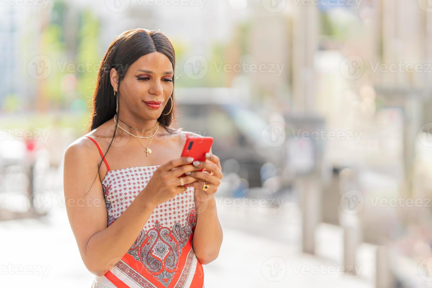 Distracted Transgender happy woman in a park 22567117 Stock Photo