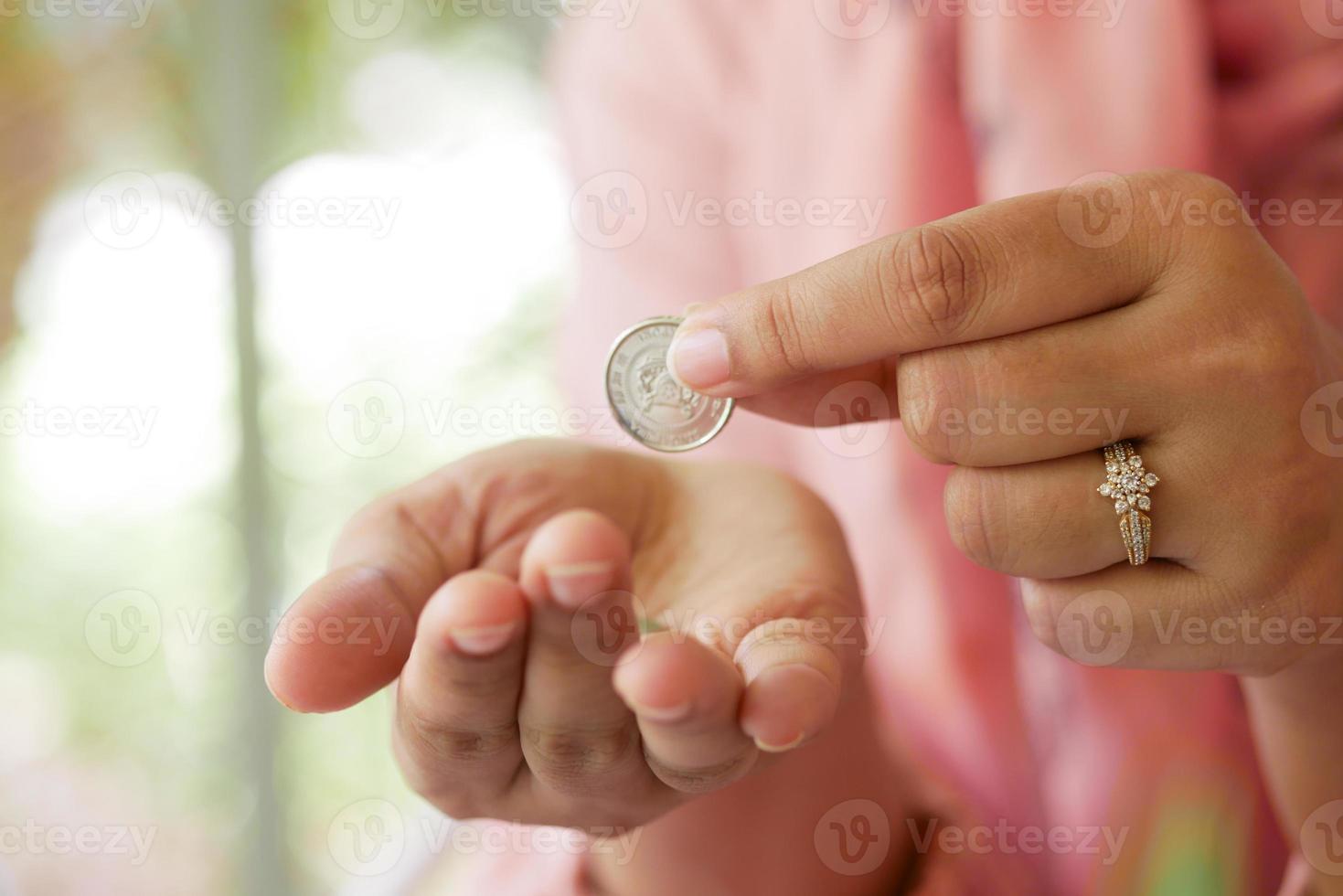 young women hand counting coins photo