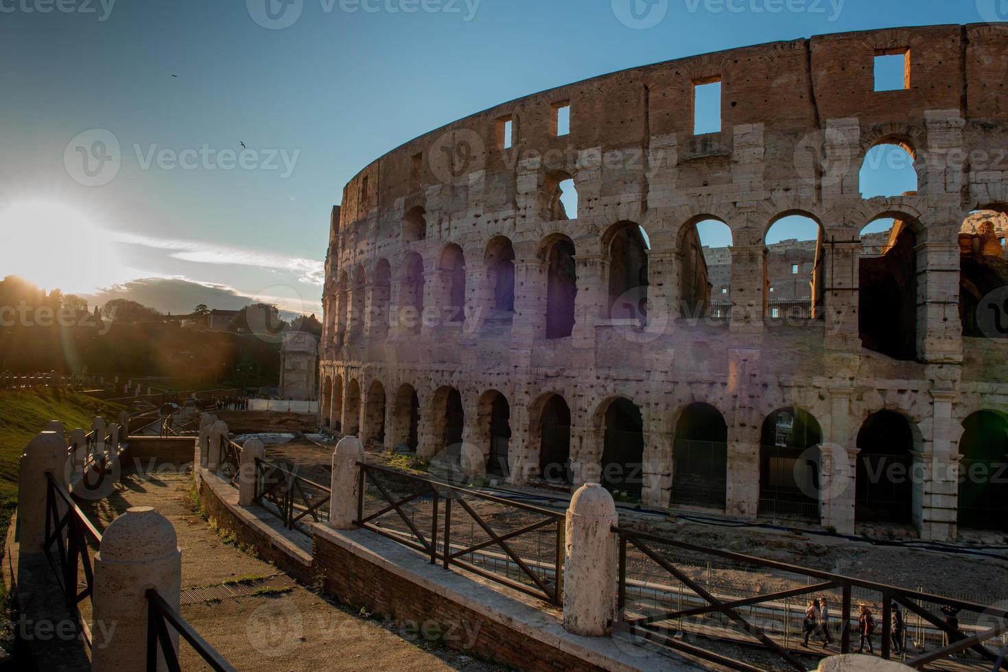 Colosseum, originally known as the Flavian Amphitheater . Located in the city center of Rome, it is the largest Roman amphitheater in the world photo