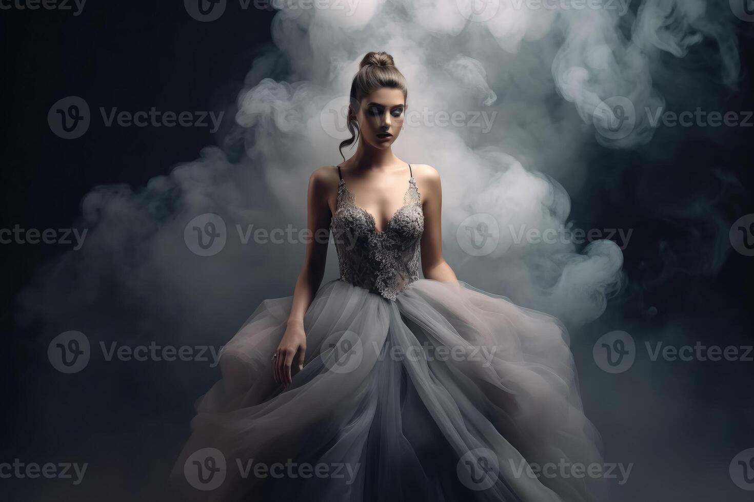 Gorgeous woman with an elegant dress and some smoke created with technology. photo