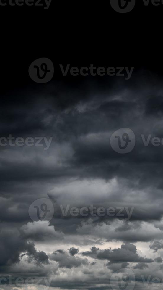 Cover page with dramatic rainy and stormy sky with heavy clouds as a background with copy space. photo