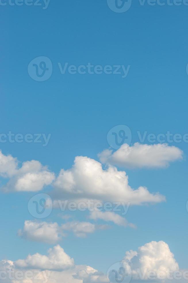 Cover page with soft blue sky with illuminated clouds as a background. photo