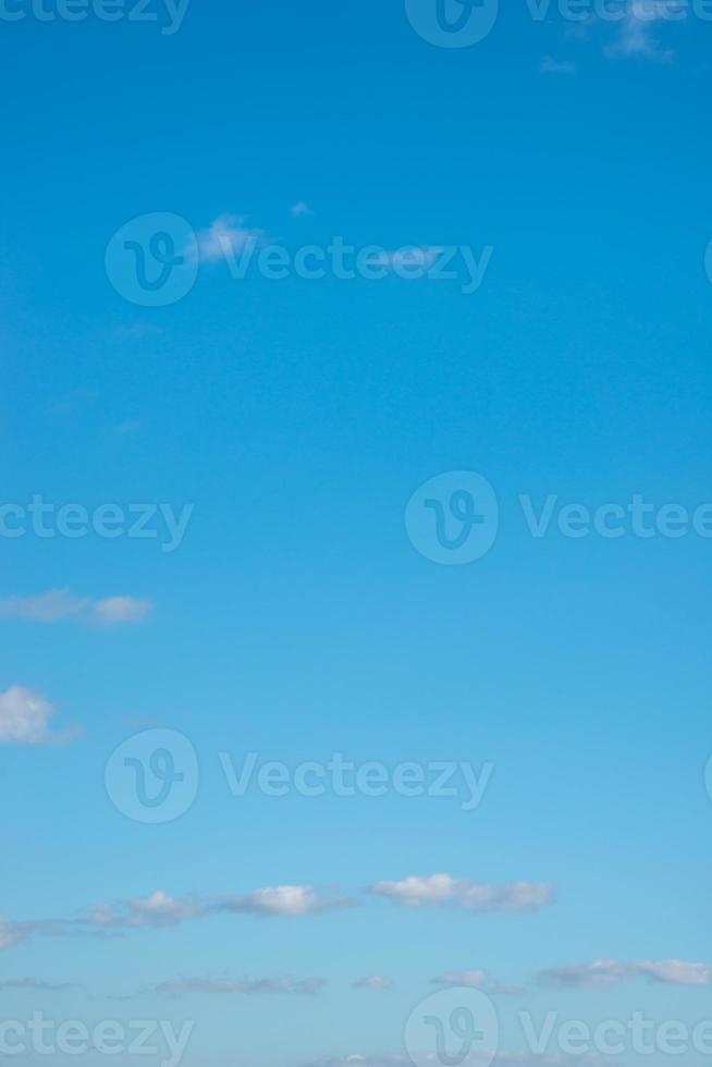 Cover page with blue deep sky with clouds as a background with copy space. photo