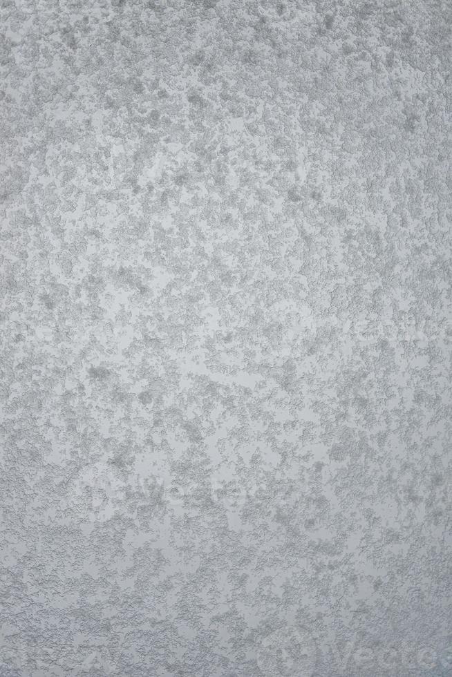 Cover page with wet and snowy with water drops and ice glass window at rainy, stormy and snowy day. Concept of seasonal mood, background with copy space. photo