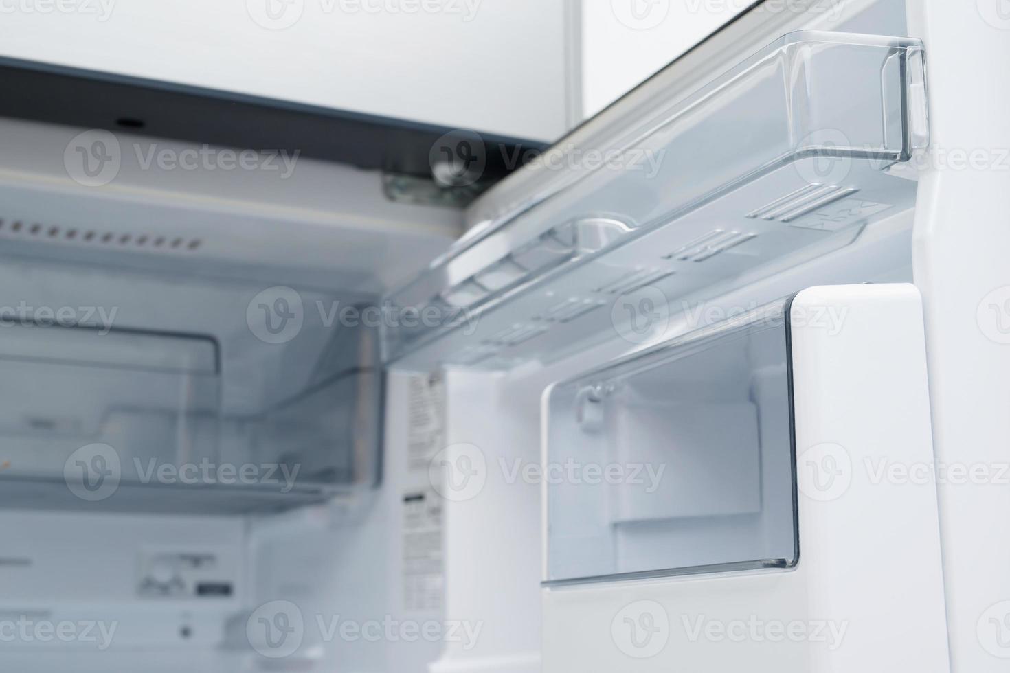 Interior view of the shelf of the refrigerator at home photo