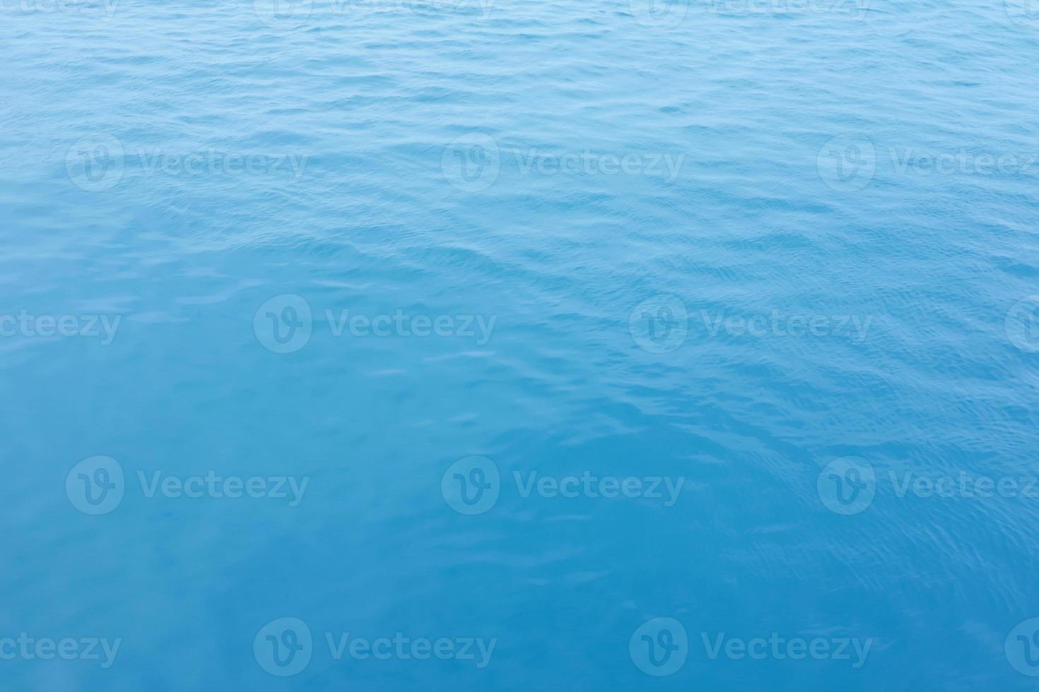 Blue Sea surface aerial view with waves from a drone, empty blank to background. soft focus. photo