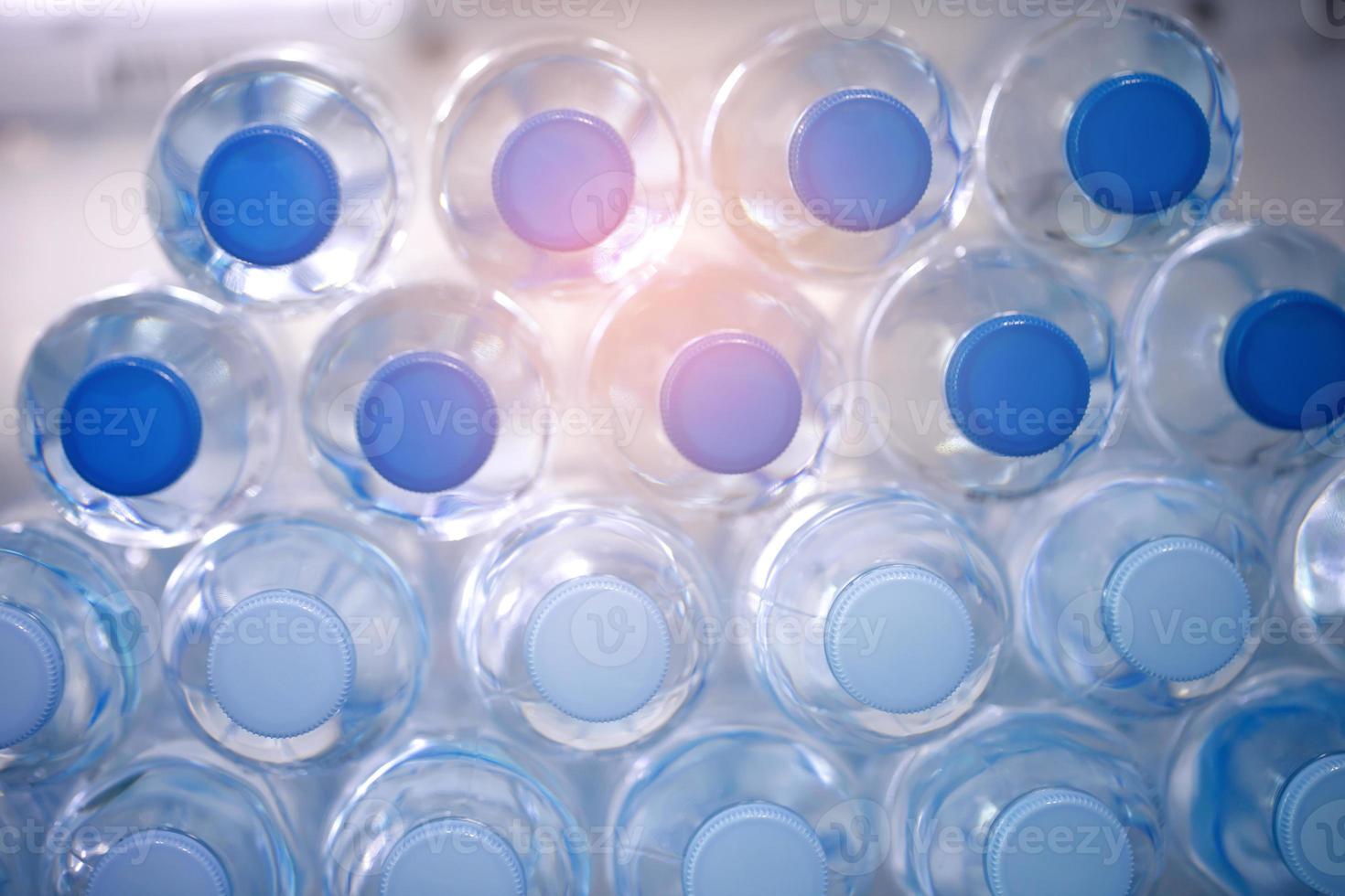 Cold drinking water bottles in the refrigerator photo