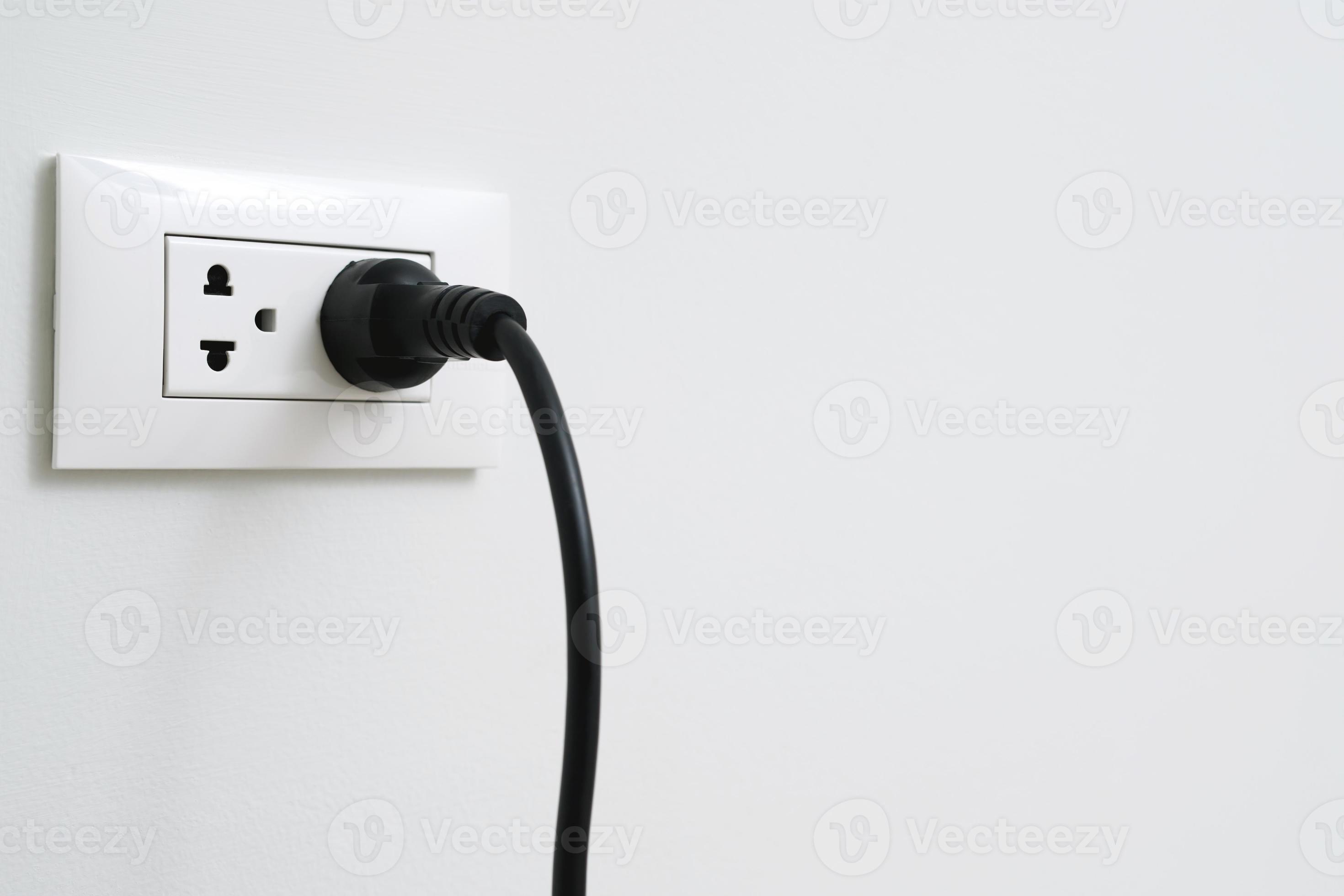 Close Up the electrical power socket and plug socket on wall. 22572966