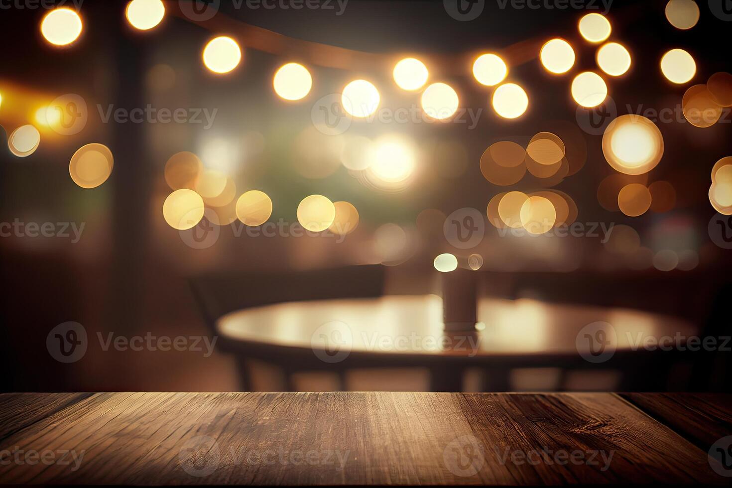 image of wooden table in front of abstract blurred background of resturant lights. Wood table top on blur of lighting in night cafe,restaurant background. selective focus. photo