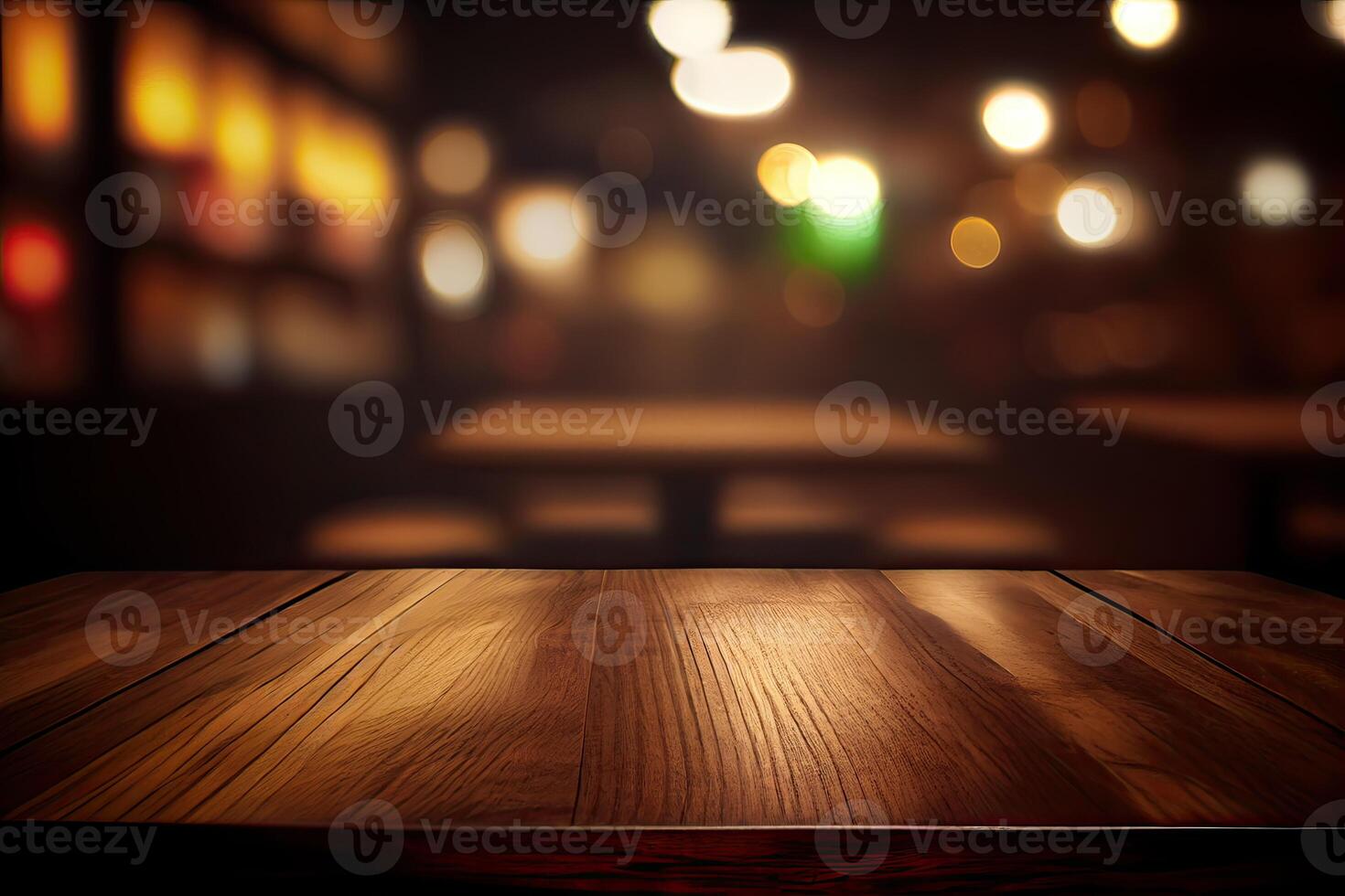 image of wooden table in front of abstract blurred background of resturant lights. Wood table top on blur of lighting in night cafe,restaurant background.selective focus. photo