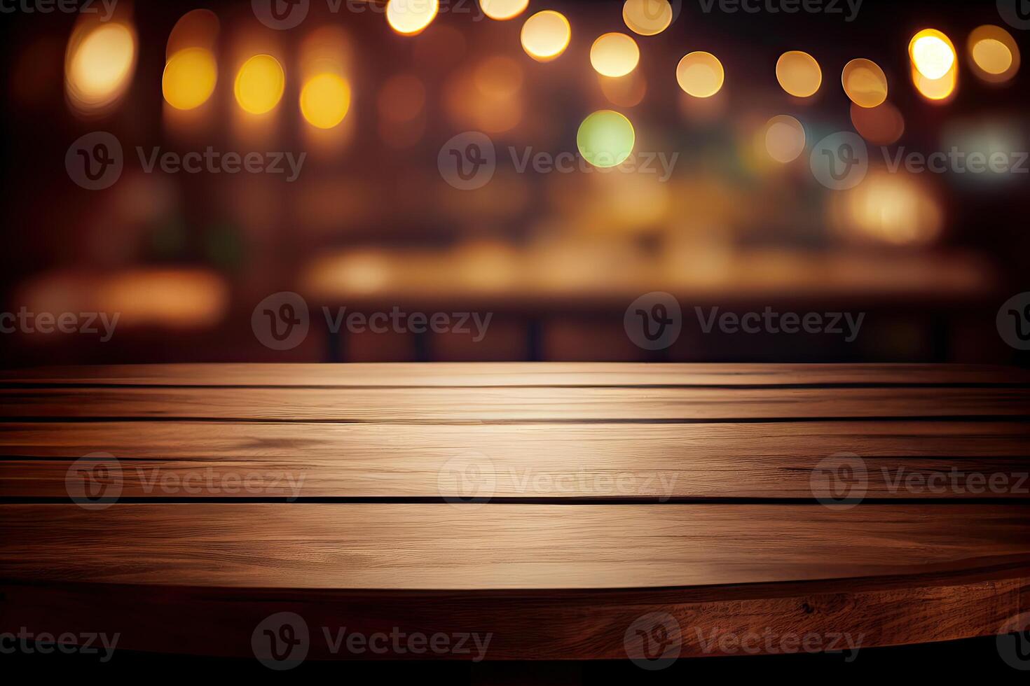 image of wooden table in front of abstract blurred background of resturant lights. Wood table top on blur of lighting in night cafe,restaurant background.selective focus. photo