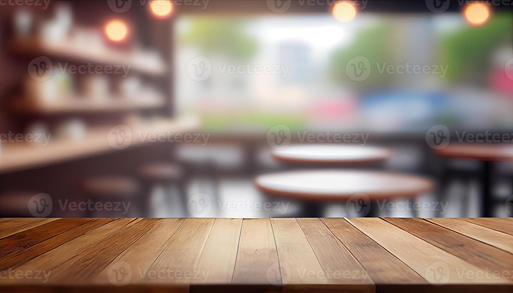 image of wooden table in front of abstract blurred background of resturant lights. Wood table top on blur of lighting in night cafe,restaurant background. selective focus. photo