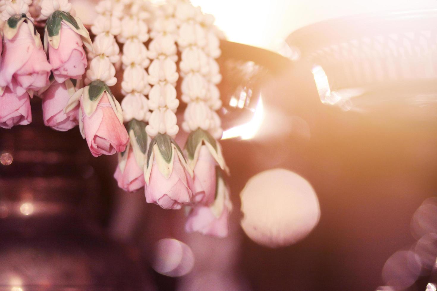 Flower garlands on a gold tray in tradition Thai wedding ceremony day. Jasmine garland photo