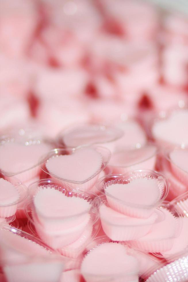 Delicious Thai sweet Desserts made from Coconut jelly in heart shape cup. Valentine day concept. photo