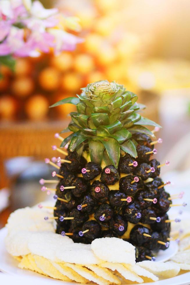 Sweet Chinese Red Date Recipes on pineapple fruits. photo