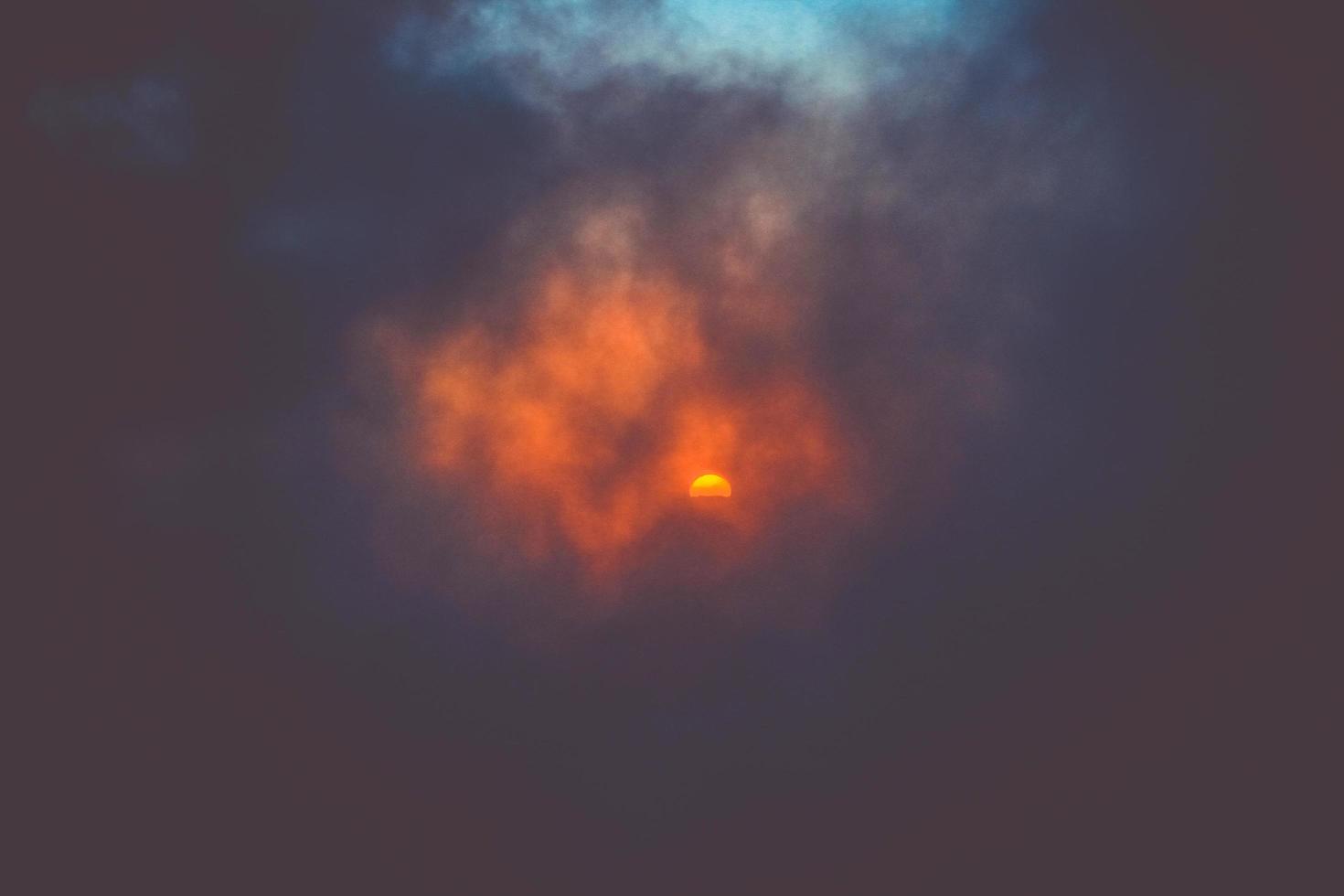 Sunset in sky and cloud, beautiful colorful twilight time with silhouette of mountain. photo