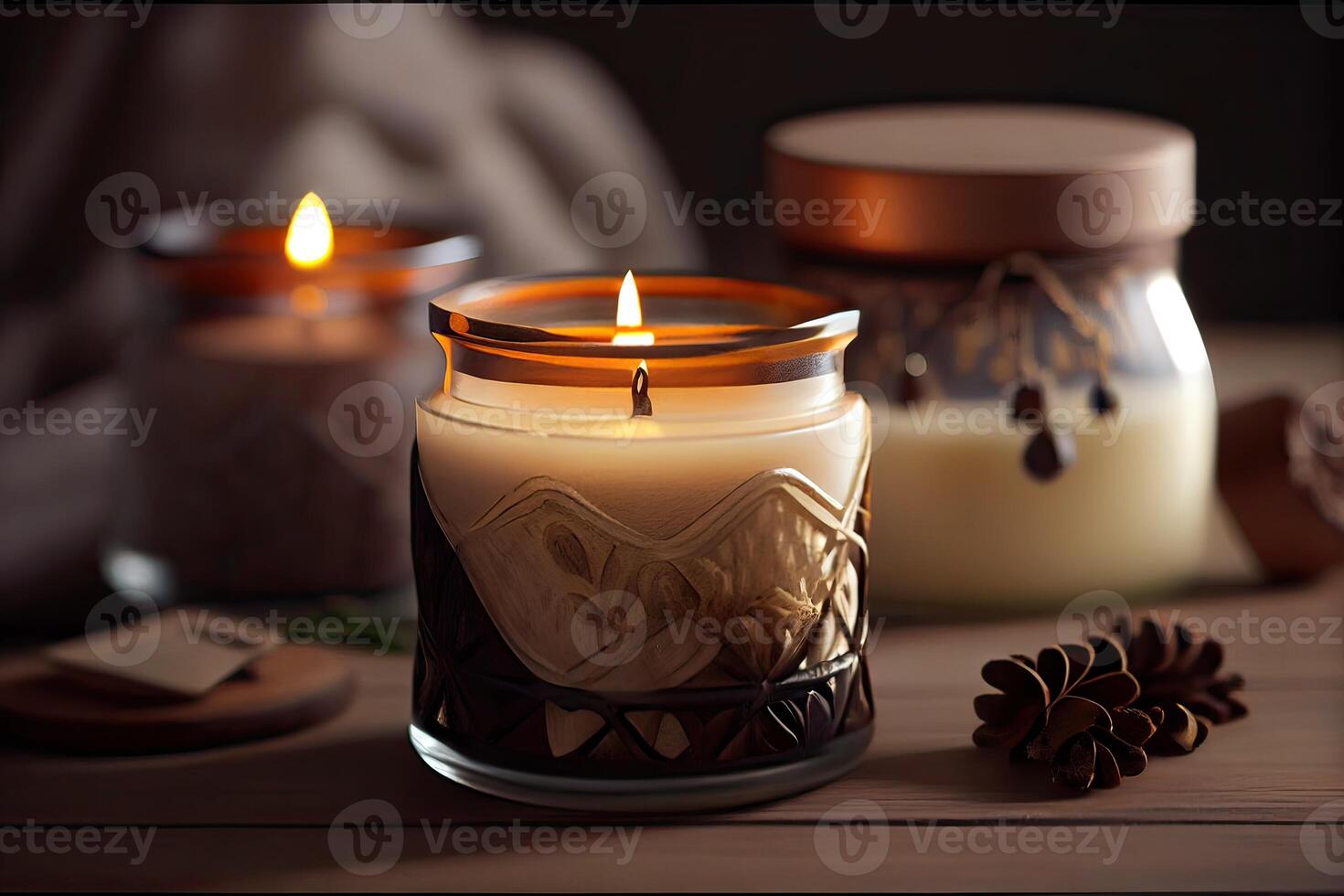 Closeup of burning candles spreading aroma on table in a spa room. Beautiful composition with grey and white candles for spa treatment. Zen and relax concept. . photo