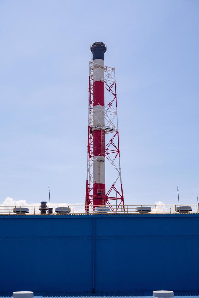 Landscape photo of chimney and stack of combine cycle power plant project. The photo is suitable to use for industry background photography, power plant poster and electricity content media.