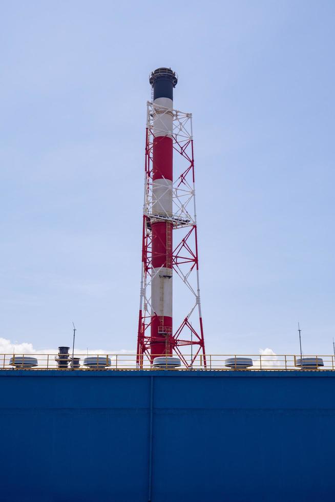 Landscape photo of chimney and stack of combine cycle power plant project. The photo is suitable to use for industry background photography, power plant poster and electricity content media.