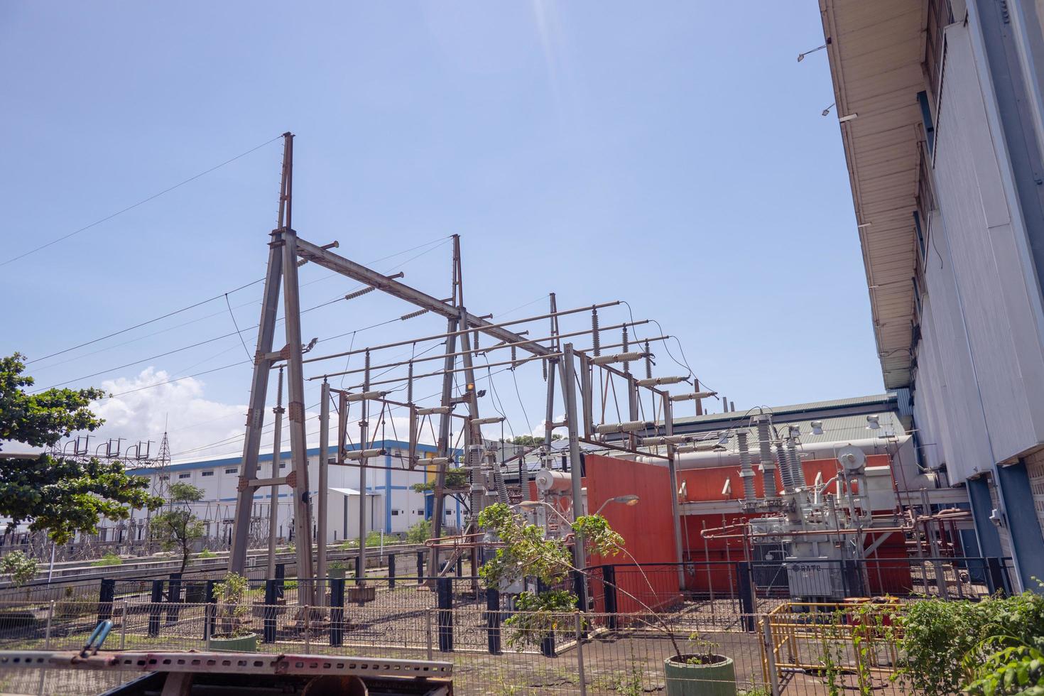 Photo of transformer and switch gear for electricity power plant. The photo is suitable to use for industry background photography, power plant poster and electricity content media.