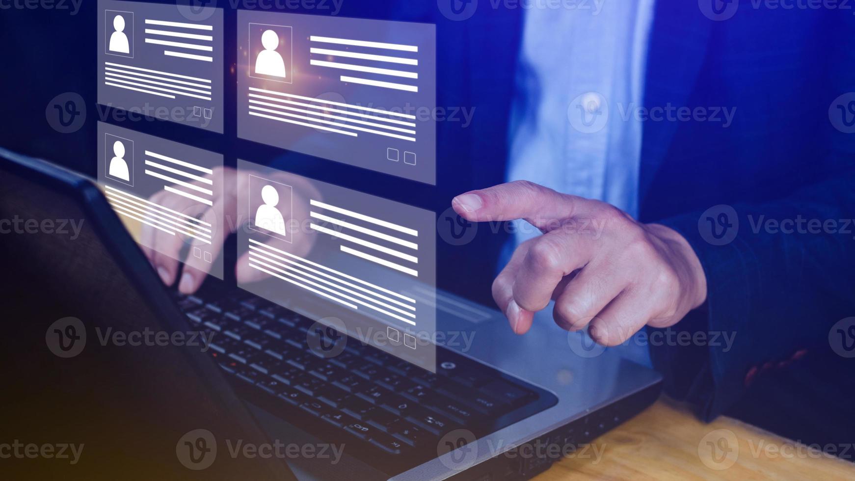 Human resources manager choosing professional profile to hire on virtual screen interface, recruitment concept. Businessman hand pointing icon resource HR management concept photo